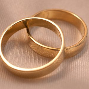 elevated gold band ring